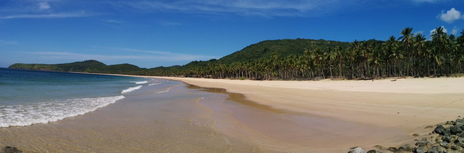 Panoramic view of the twin beaches at Nacpan and Calitang, El Nido